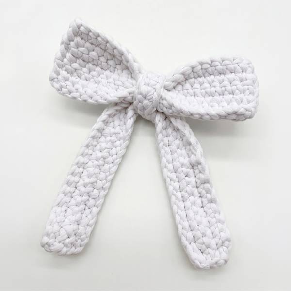 Chenille crocheted hair bow laid flat