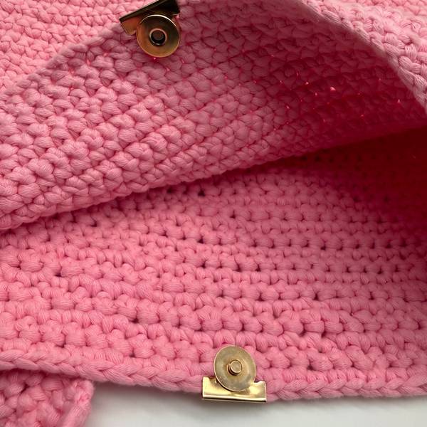Inside the purse showing the gold magnetic snap